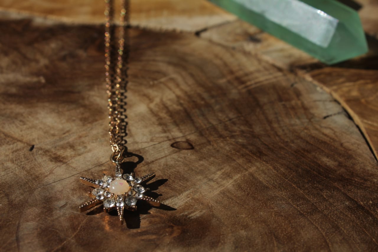 GOLD SPARKLE CUT SUN NECKLACE