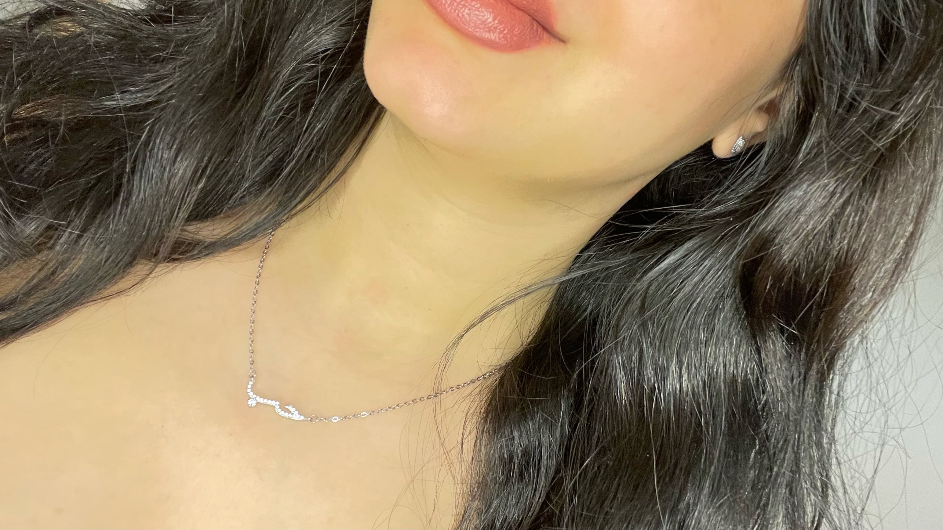 SILVER NECKLACE WITH THE WORD LOVE